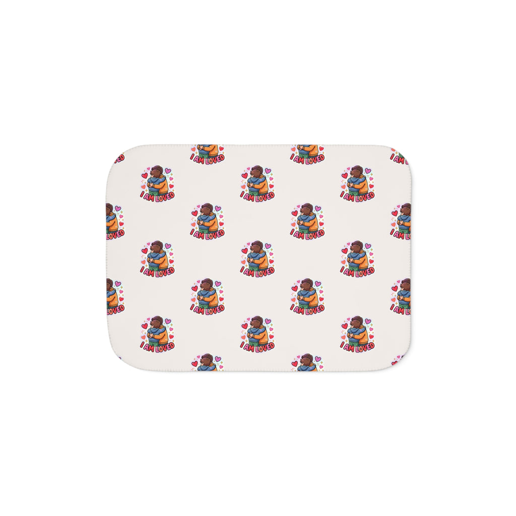 I Am Loved sherpa blanket with a repeating pattern of children hugging and hearts on cream – additional view